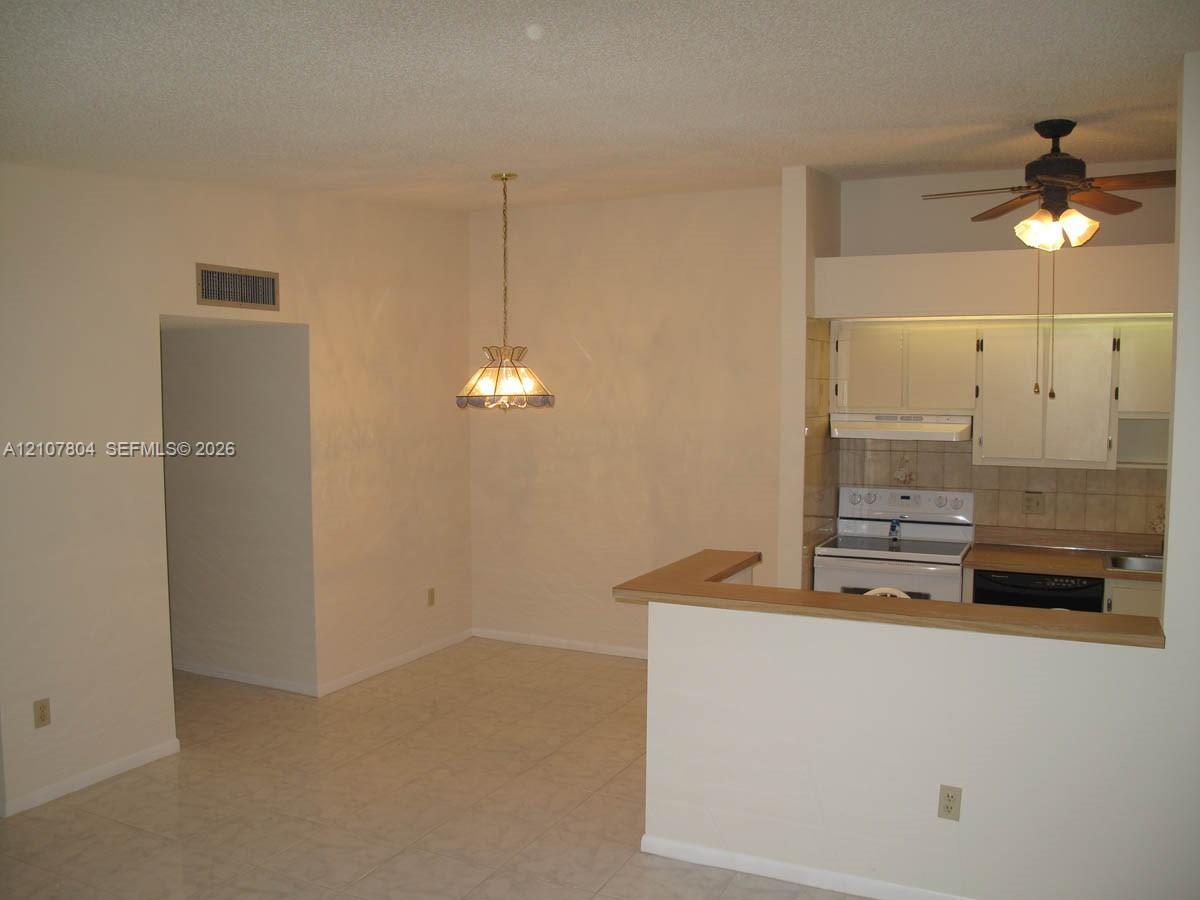 9940 S Belfort Cir # 203, Tamarac FL 33321